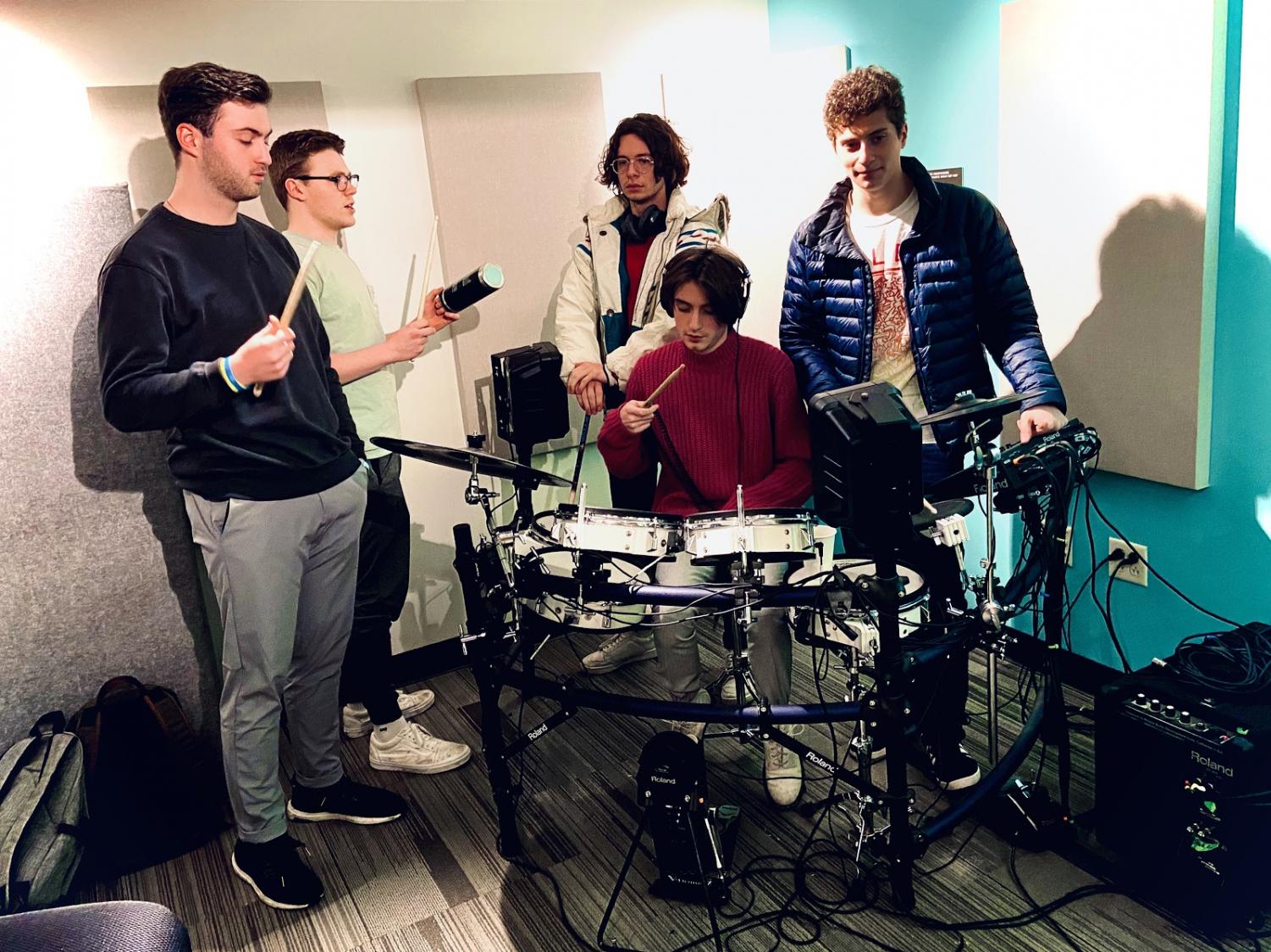 Members of funk-pop band "Bottom Text" practice their latest set. Photo by Andrei Olaru 