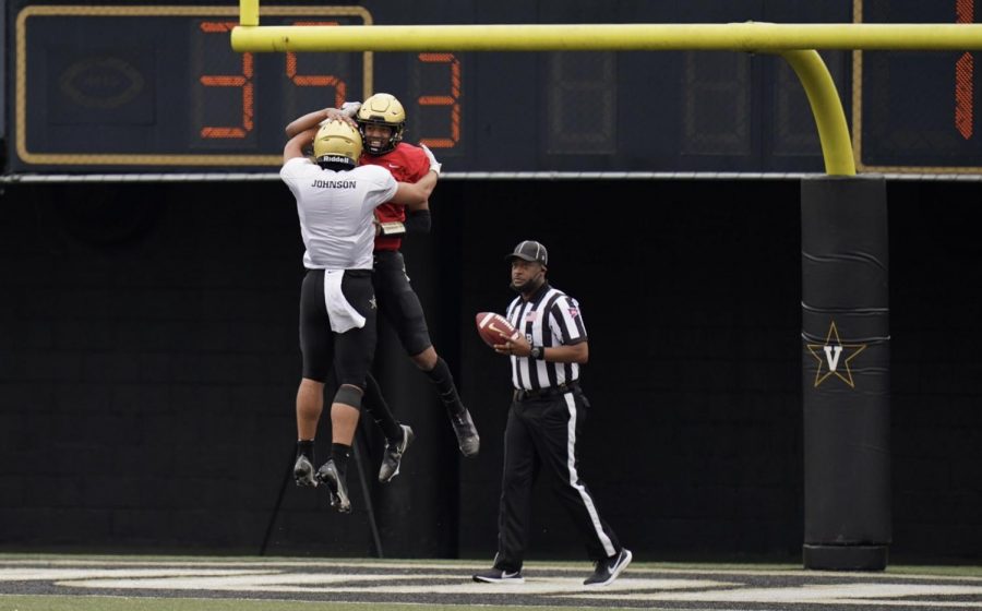 Cam Johnson and Mike Wright embrace after a touchdown in Vanderbilt's spring game. (Vanderbilt Athletics).