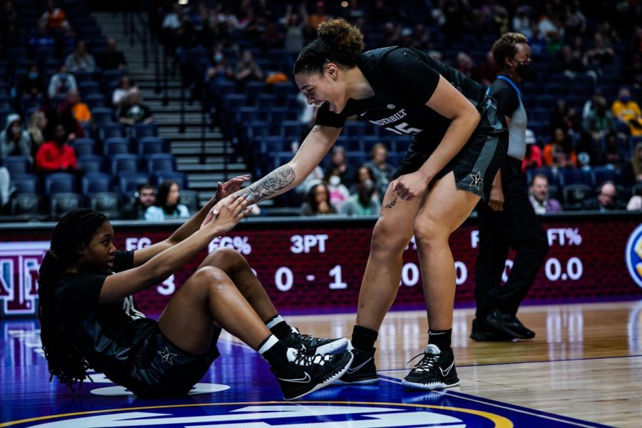 Vanderbilt's pair of All-SEC freshmen Iyana Moore and Sacha Washington pick each other up during Vanderbilt's SEC Tournament win over Texas A&M on March 2, 2022.