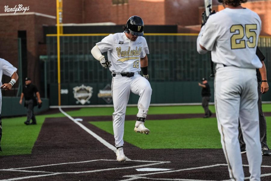 Dominic Keegan stomps on home plate after hitting a home run in Vanderbilt's win over Texas A&M on April 29, 2022.