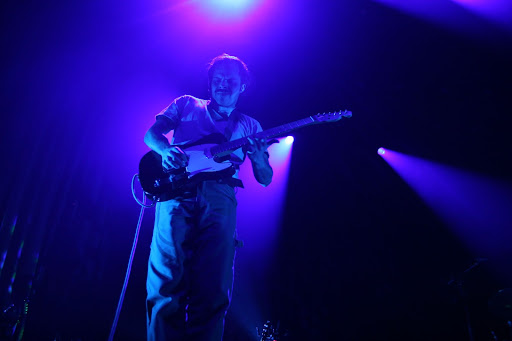 A musician playing guitar