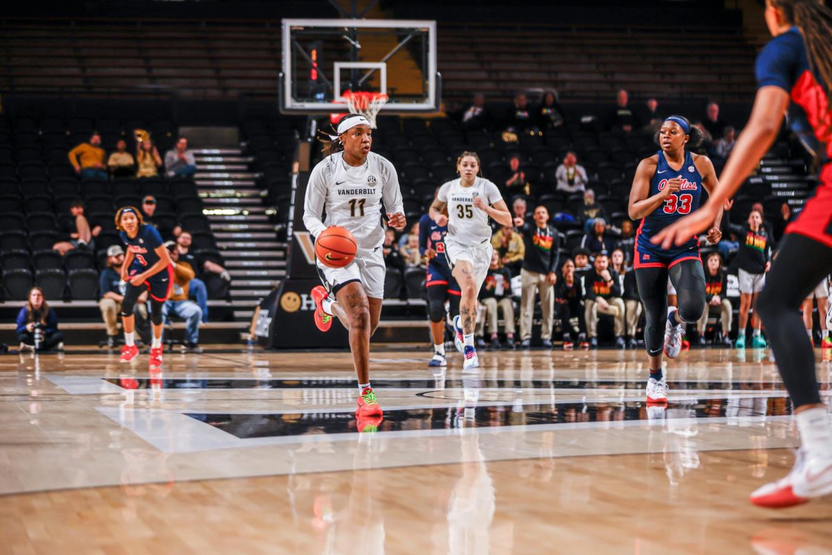 Jordyn Oliver dribbles the ball passed mid-court, as photographed on Feb. 2, 2024. (Hustler Multimedia/Josh Rehders)