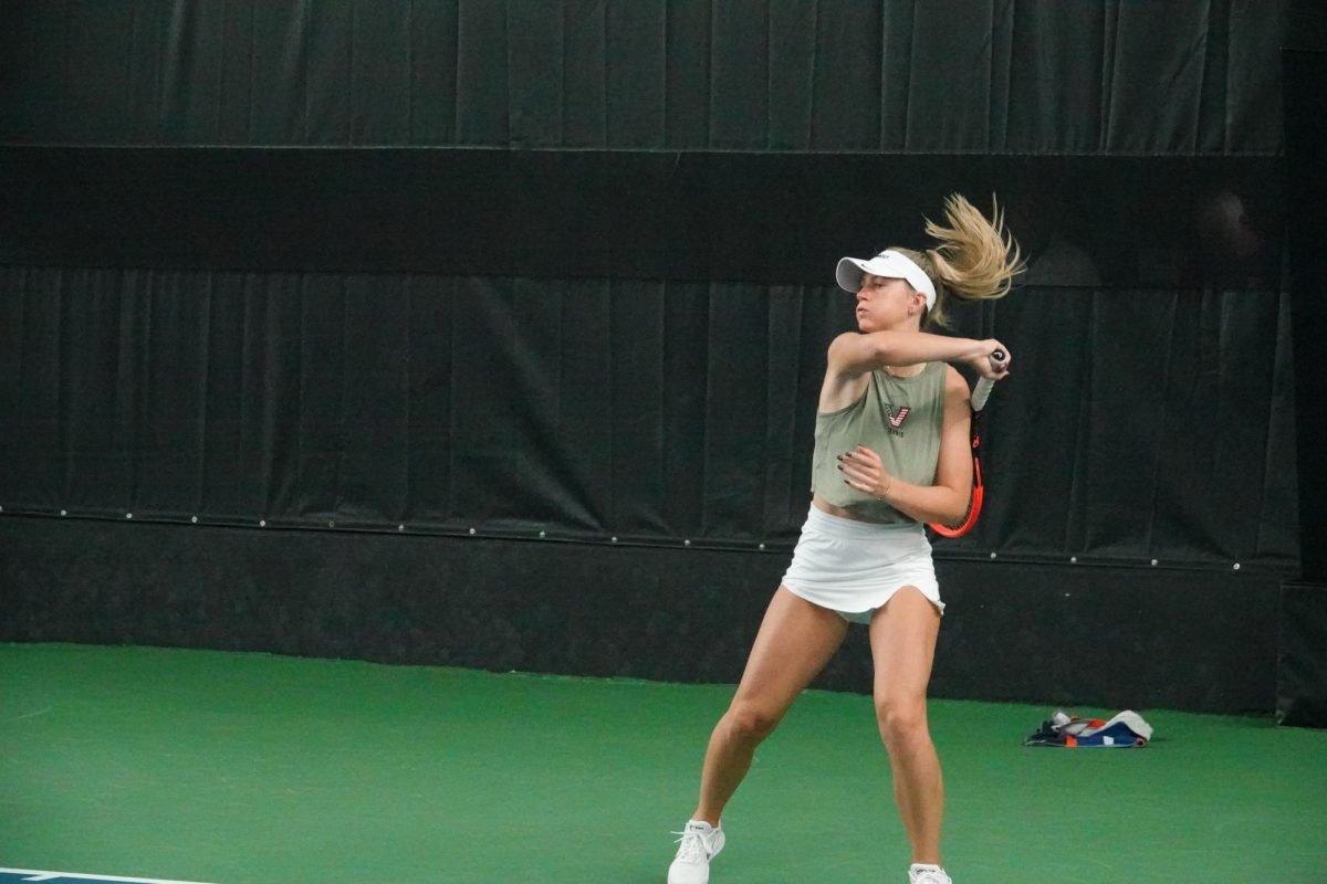 Vanderbilt Women's Tennis player hits ball back to opposing team, as captured on October 26, 2024. (Hustler Multimedia/Emily Park)