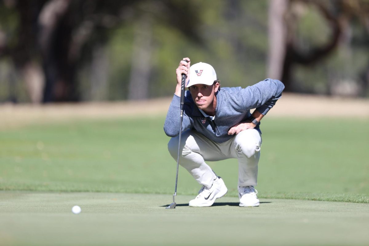 Jackson Van Paris reads a putt, as photographed on February 17, 2025. (Vanderbilt Athletics)