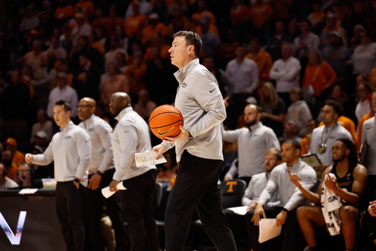 Mark Byington walks with the basketball, as photographed on Feb. 15, 2025. (Hustler Multimedia/Barrie Barto)