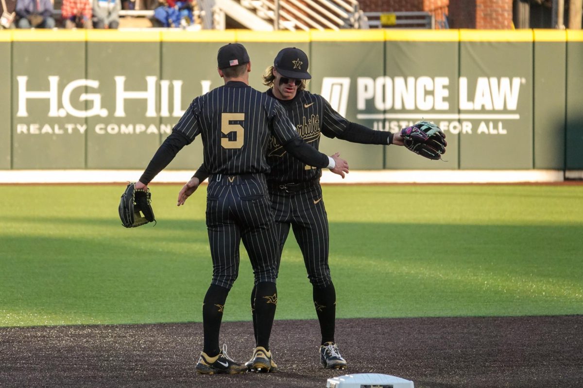 Jonathan Vastine and Mike Mancini on the field