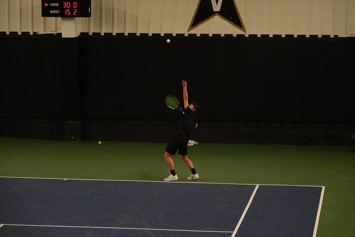 Player tosses up to serve the ball as photographed on Feb. 7, 2025. (Hustler Multimedia/Natalie Do Amaral).