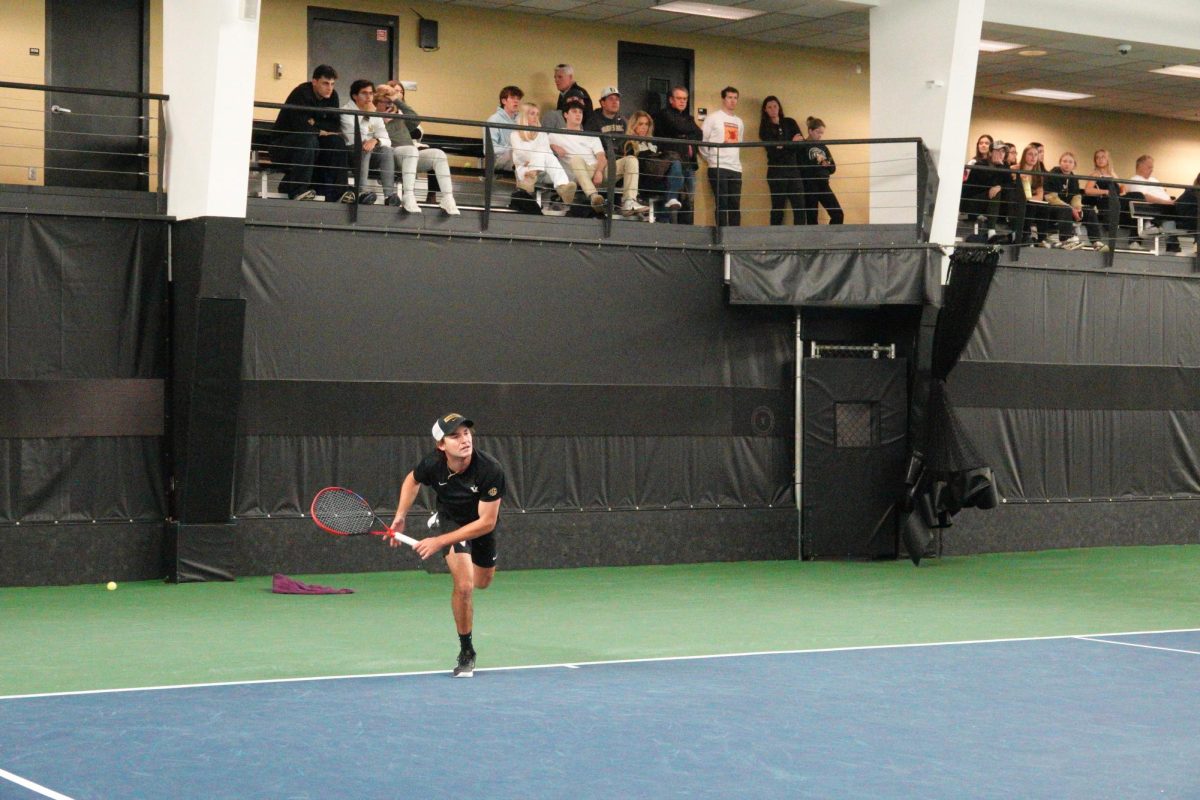 Nathan Cox serves, as photographed on Feb. 7, 2025. (Hustler Multimedia/Meagan To)