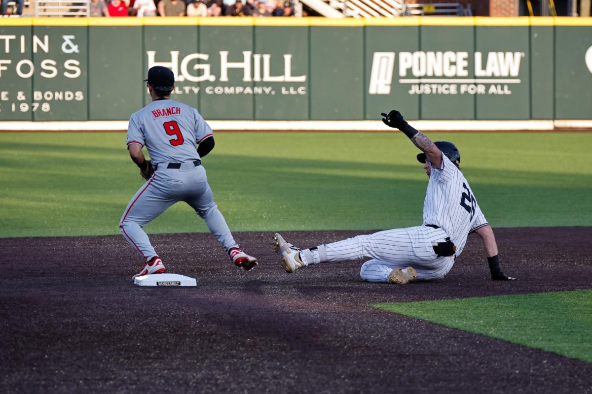 Braden Holcomb slides, as photographed on April 18, 2025. (Hustler Multimedia/Barrie Barto)