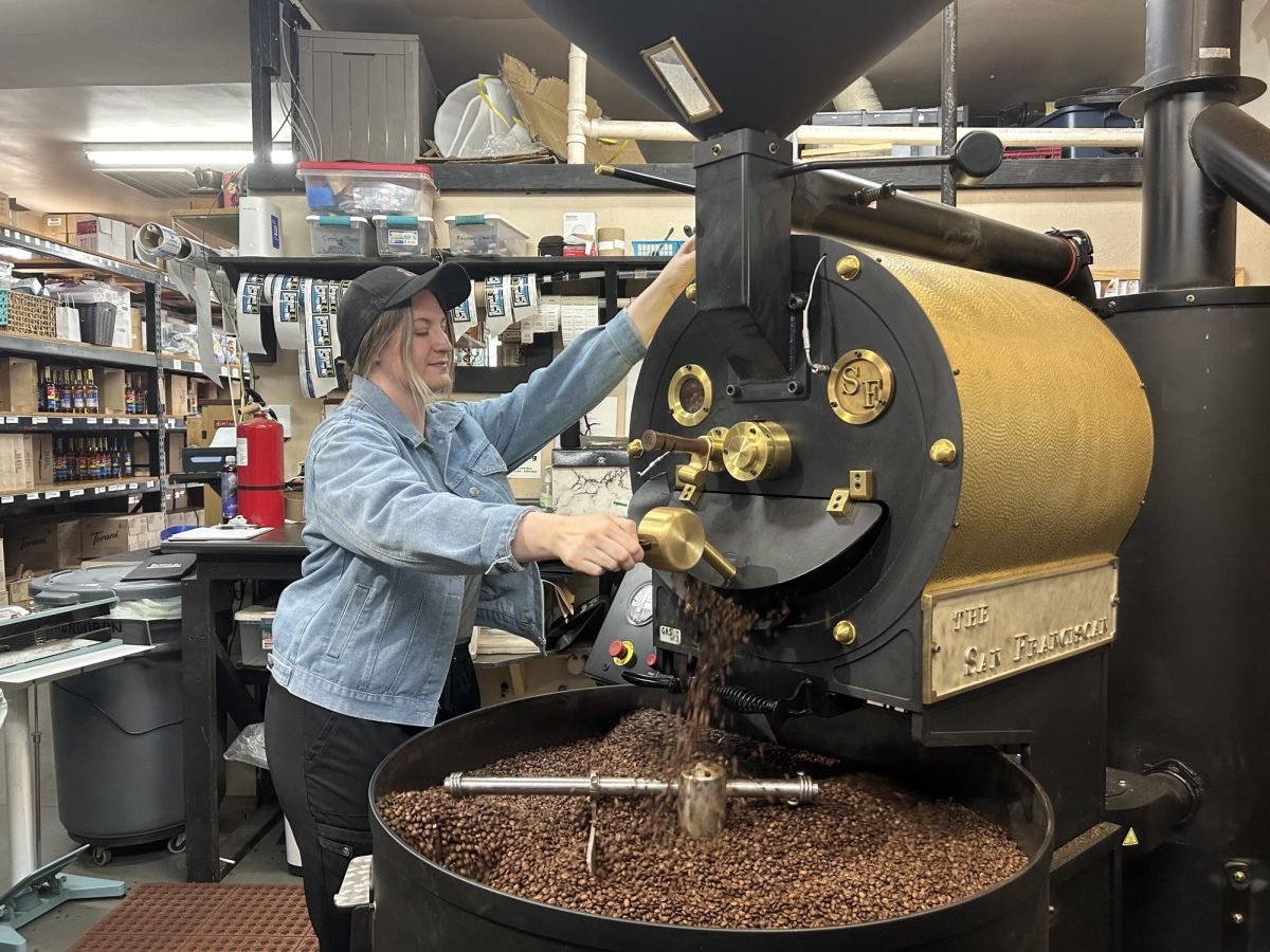 Coffee pours out of a drum roaster, as photographed on March 26, 2025. (Hustler Staff/Jorie Fawcett)